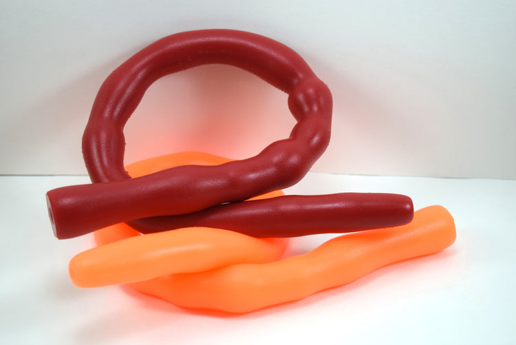 dark red and orange Shower Shooter 24-inch ribbed silicone nozzle with multi-ribbed texture, showing the 23-inch insertable length on a white background curled up