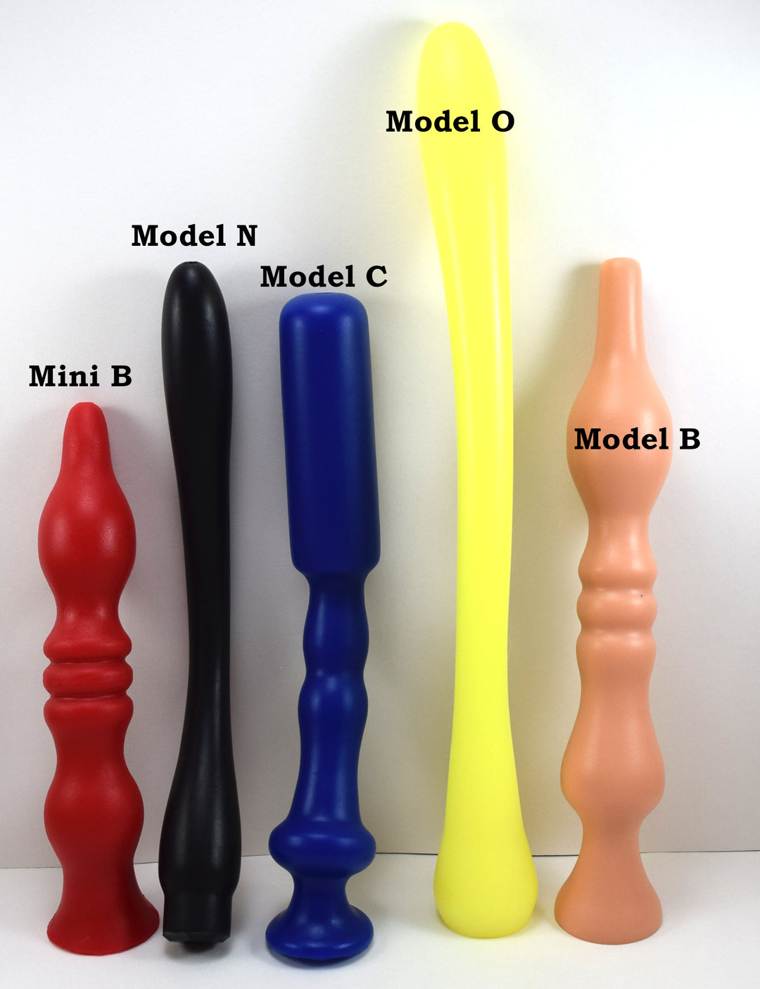 Vertical product comparison lineup featuring Mini B, Model N, Model C, Model O, and Model B silicone enema nozzles.