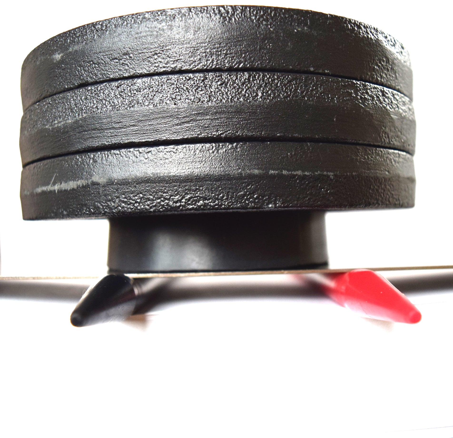 15 lb weight compression test on a 00-50 firmness silicone tube under a flat steel plate.