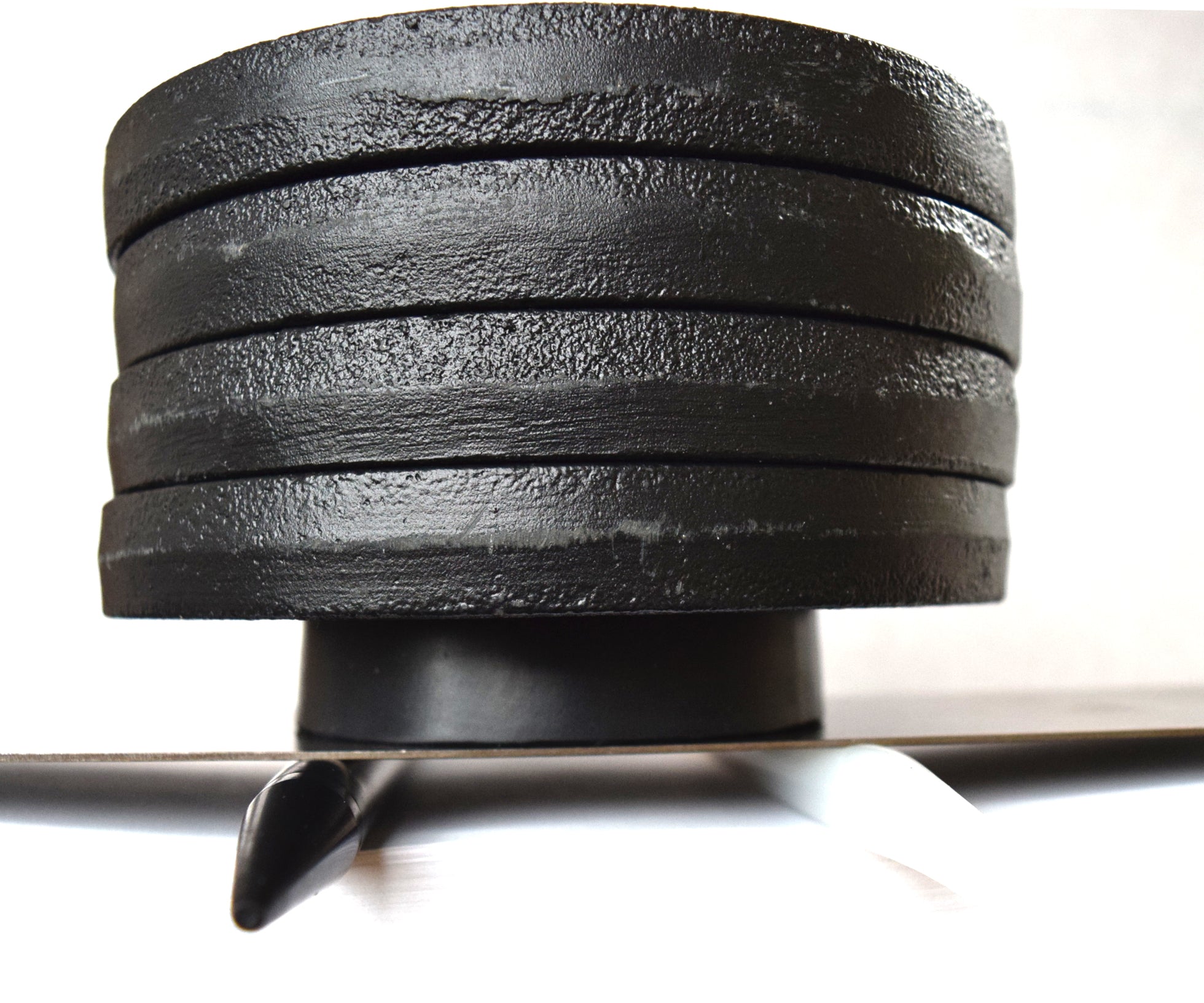 20 lb weight compression test on a 10 firmness silicone tube under a flat steel plate.