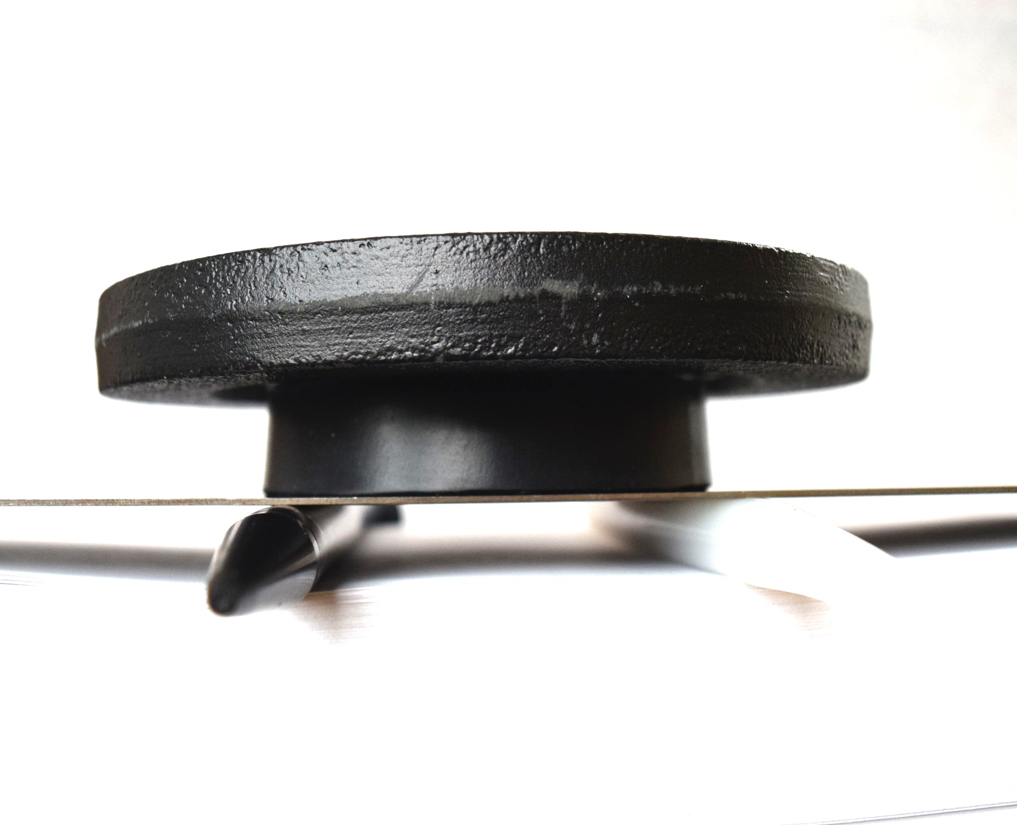 5 lb weight compression test on a 10 firmness silicone tube under a flat steel plate.