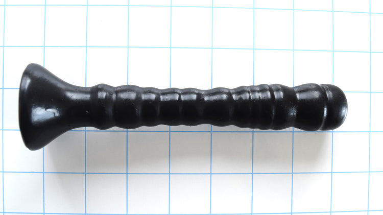 Small Ribbed Shaft black silicone multi-purpose enema nozzle showcasing its 6-inch insertable length, 10 alternating textured ribs, tapered 7/8-inch mid-shaft, and 1.875-inch trumpet safety base on a grid background