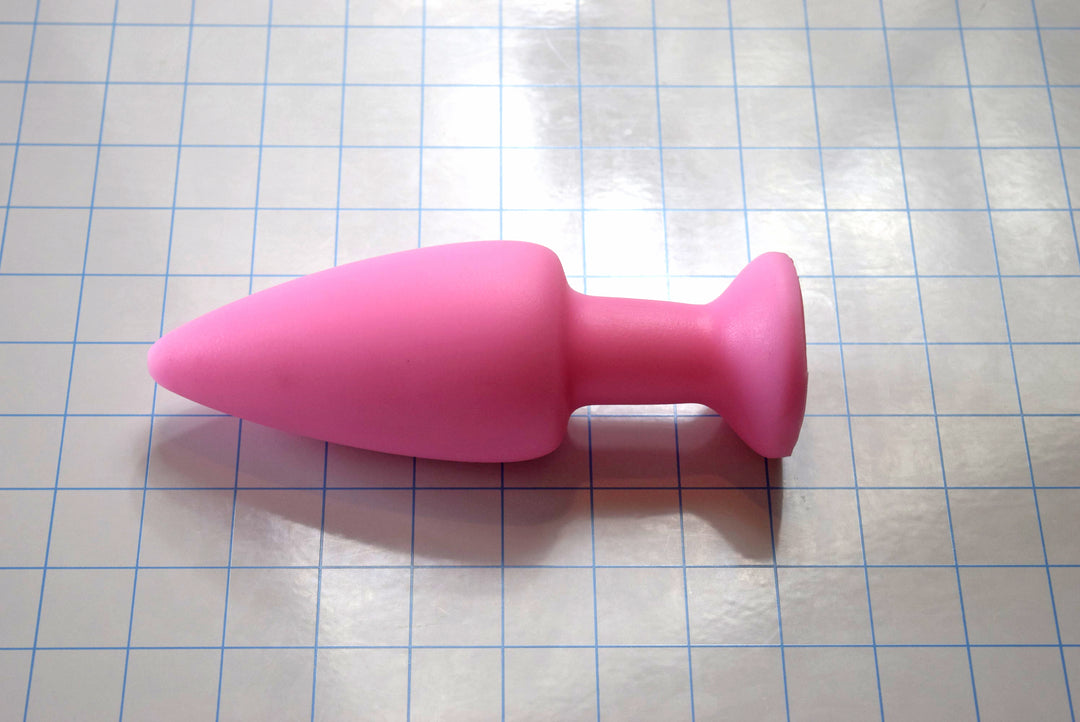 SPD2.5 retention style silicone nozzle with a 4.5-inch tapered tip, 2.5-inch maximum diameter, and deep V-style base
