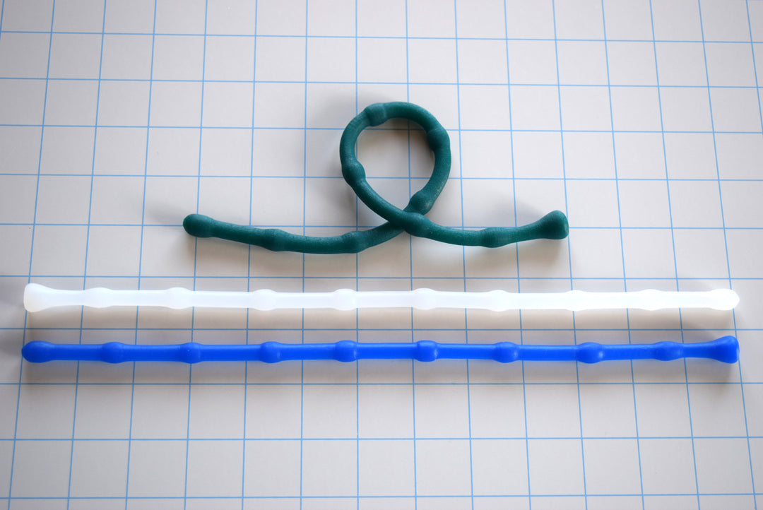 SSND-BEADBALL 7-10mm beaded urethral sound showing colored silicone variations, 330mm length, 320mm insertable, 21-30 French.