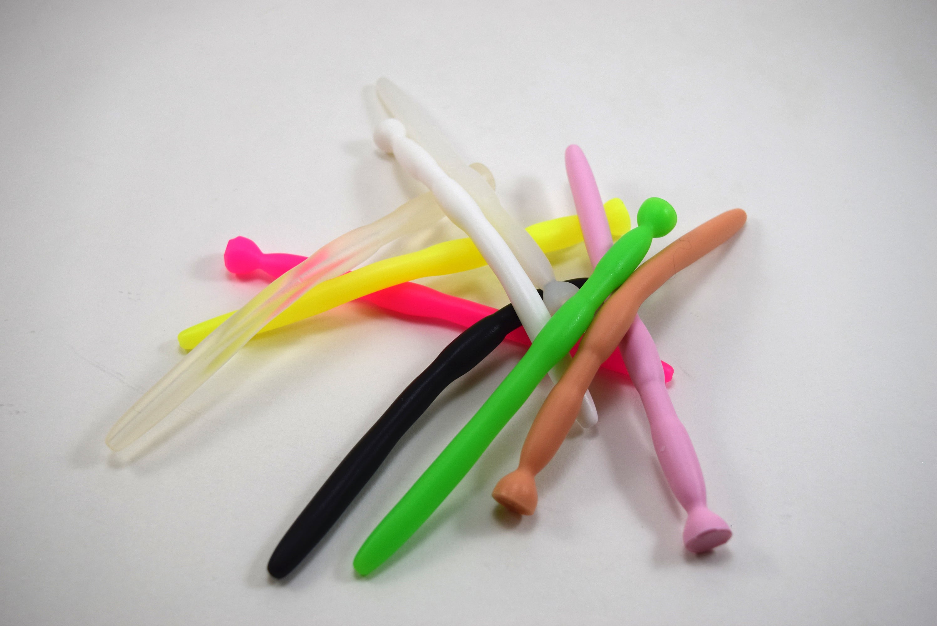 SSND-BMK2 silicone sounds displayed in colorful array showing 9.5mm shaft, dual 11mm expansion barrels, 5.5mm retention groove, and flared safety base.
