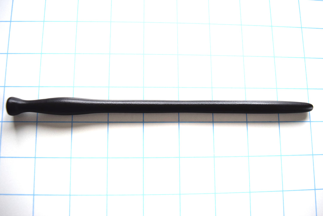 SSND-BMK3 black silicone sound on grid background showing tapered tip, undulating shaft swells, 12mm barrel, and retention valley.