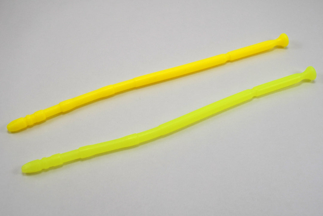 Two bright yellow 13-inch contoured silicone sounds with multi-faceted tips laid parallel on a plain white background.