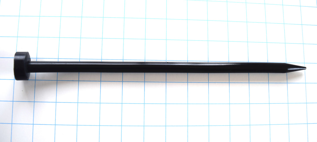 SSND-SPEAR-A 12.5mm smooth silicone urethral sound featuring a 4mm tapered tip expanding over 1 inch to a spear-pointed head, 11-inch smooth shaft, and 12-inch insertable length on a grid background.