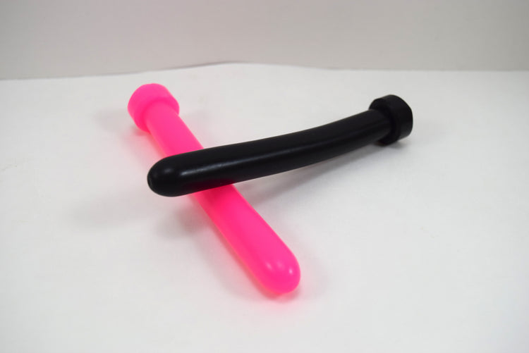 Black SSND 14mm silicone sound called The Rod resting diagonally across a bright neon pink sound against a plain white background.