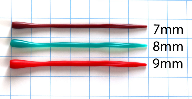 Size comparison of the SSND-THING 7-inch small silicone sounding rods in 7mm, 8mm, and 9mm diameters against a grid