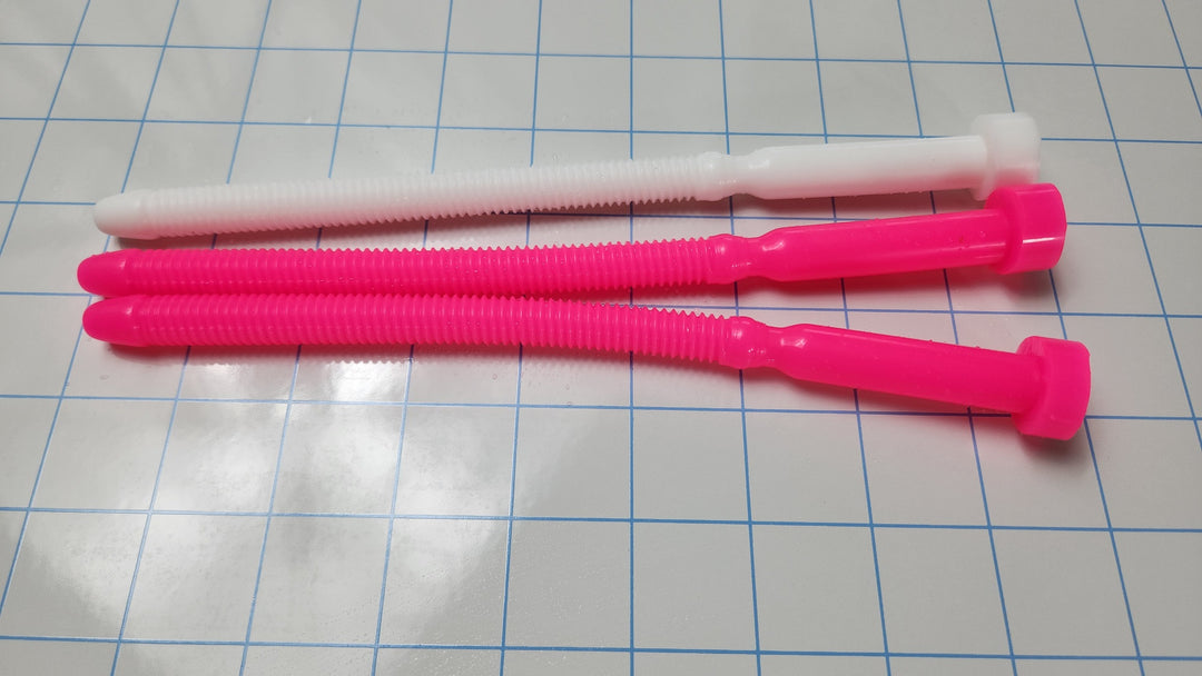 Three SSND-THREADED13 silicone urethral sounds (one white and two pink) displayed horizontally on a blue grid background, featuring an 8.3-inch insertable length and threaded texture.