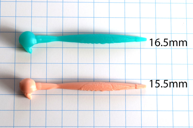 The Ribbit 15.5mm and 16.5mm silicone urethral sounds side by side on a grid background, showcasing the textured frog-skin shaft and bulb details.