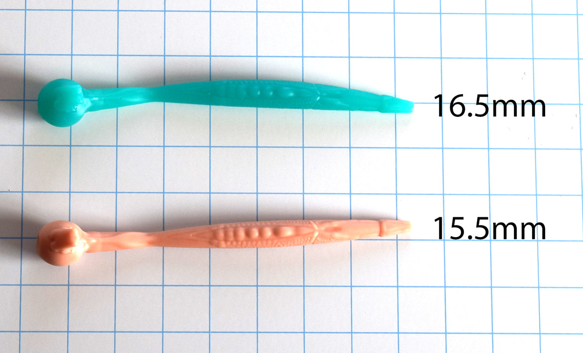 Top-down view of 15.5mm and 16.5mm The Ribbit silicone sounds on a measurement grid, highlighting the textured grip and sculpted flange design.