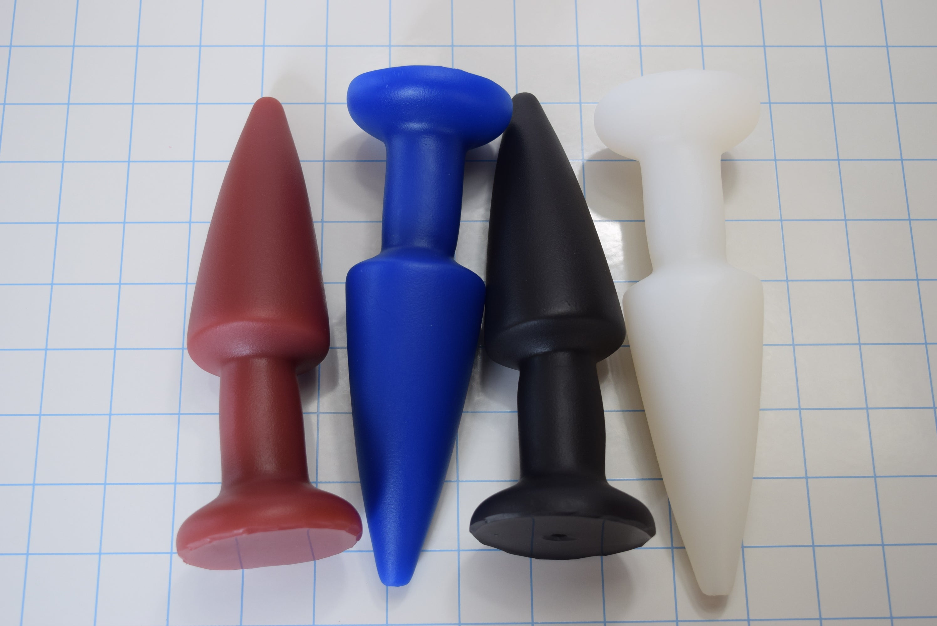 SPD2.0 medium-large retention style silicone nozzle featuring a 4.25-inch tapered tip, 2-inch maximum diameter, and a safety retaining flange